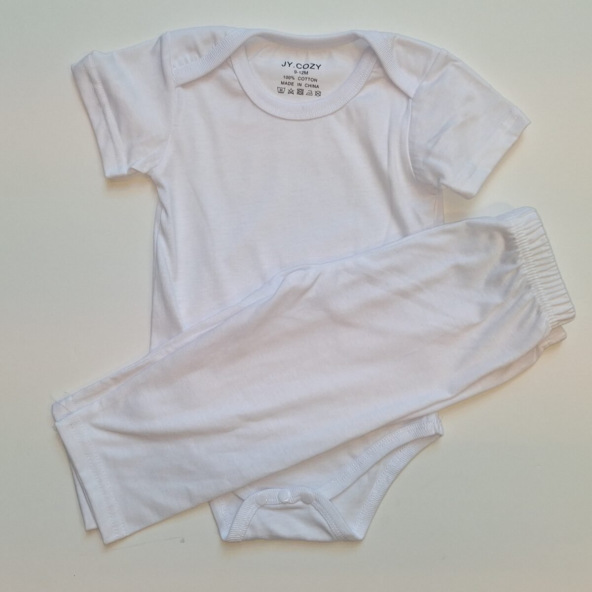 Elevate your style effortlessly with this versatile White Short Sleeve Bodysuit and Leggings Set. Crafted from comfortable material, it's perfect for mixing and matching to create multiple chic looks.