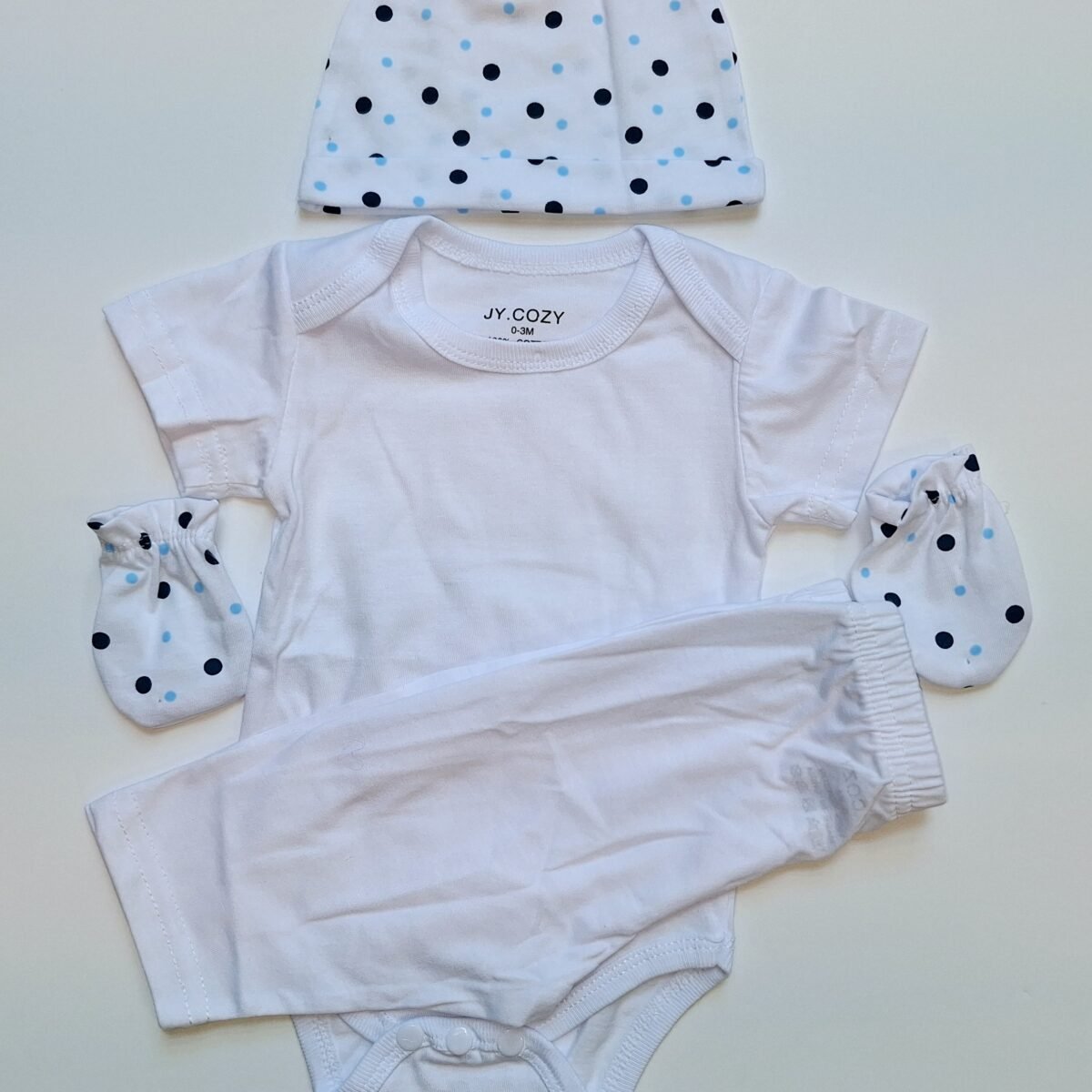 Wrap your little one in ultimate cuteness with this white short sleeve bodysuit adorned with a charming blue spotted hat and mittens. Designed for both comfort and style, it's the perfect choice for your precious baby.