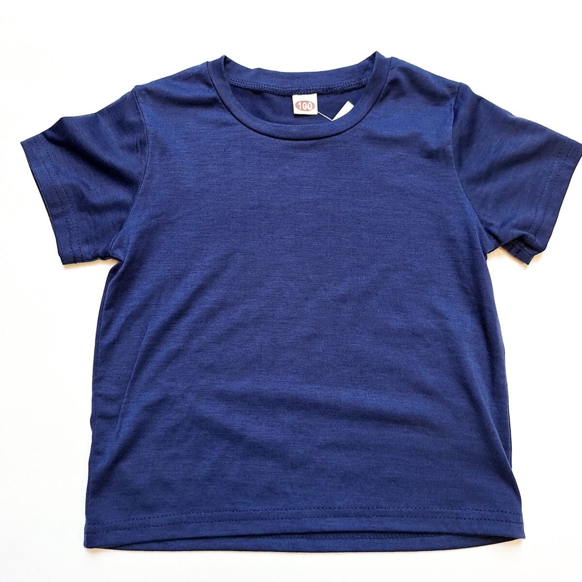 Indulge in the softness of our Boys Navy T-Shirts crafted from premium cotton, featuring a timeless navy hue and a classic design for effortless style and comfort. Elevate your little one's wardrobe with this versatile must-have piece today!