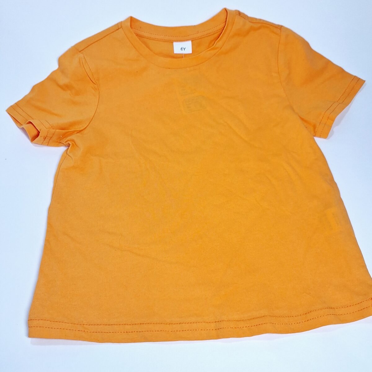 Elevate your little boy's wardrobe with this vibrant orange t-shirt. With a comfortable fit and versatile style, it's the perfect addition for any casual or active occasion.