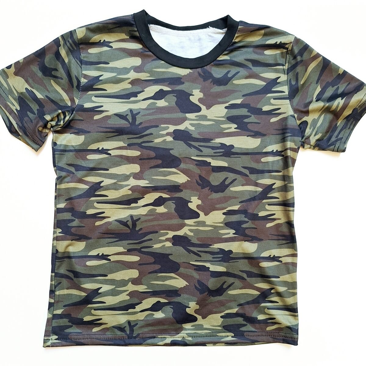 Step up your style game with this versatile Camouflage T-Shirt. Its comfortable fabric and stylish camouflage pattern make it a must-have wardrobe essential. Add it to your cart now and elevate your look!