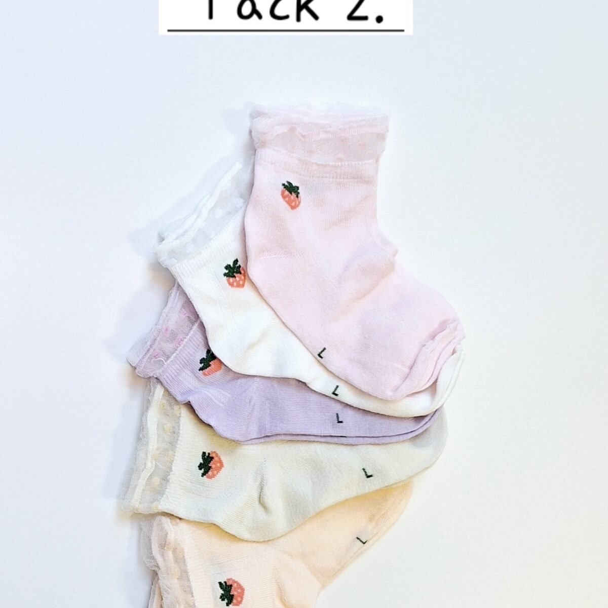 Step up your little one's style with these adorable girls' socks Pack 2. Designed for comfort and made from durable material, these socks are a must-have for every young fashionista's wardrobe.