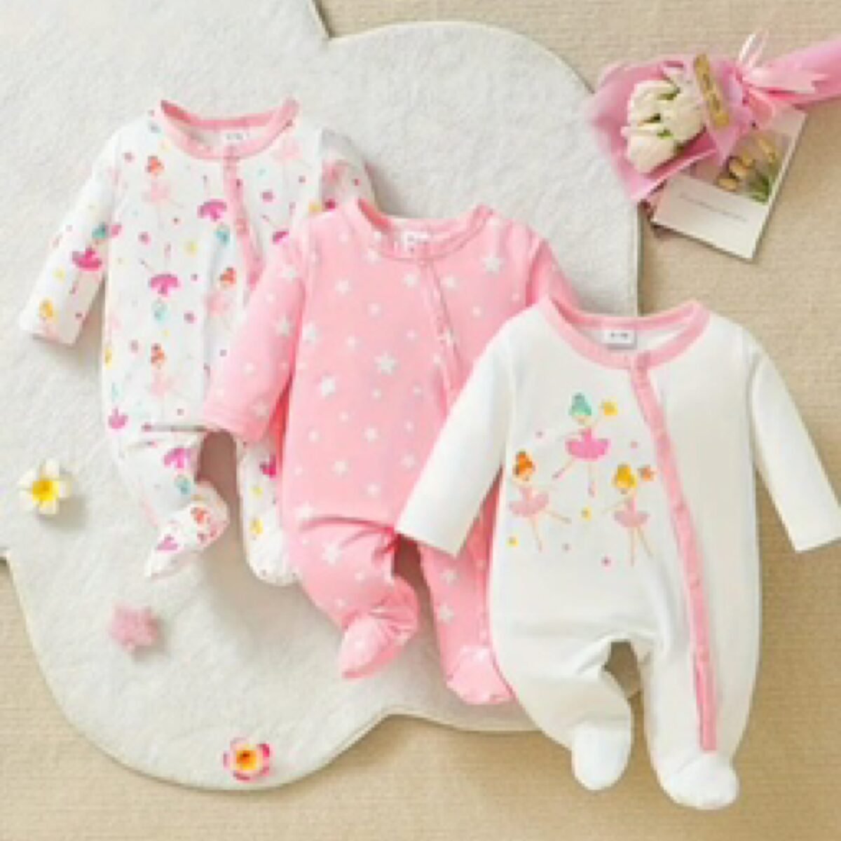 Discover the enchanting Baby Girls Cute Fairy 3-pack Sleep-suits, specially designed for newborns. With an adorable design and soft, comfortable fabric, these sleep-suits are perfect for ensuring your little one's peaceful slumber. Treat your baby girl to the ultimate comfort and style with these charming sleep-suits!